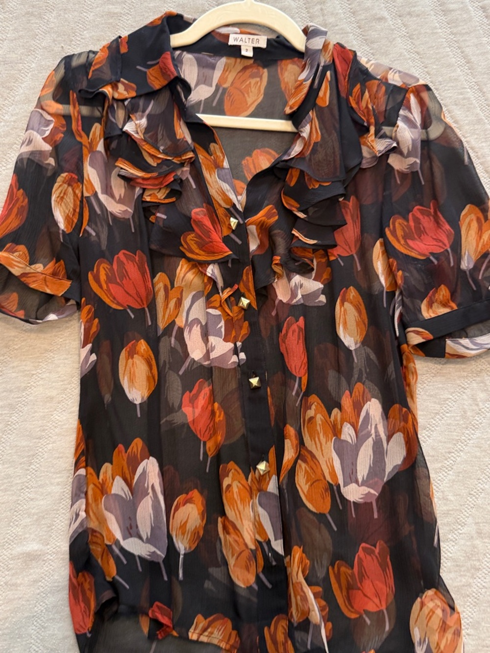 Ruffled Tulip-Print Blouse in Black and Orange